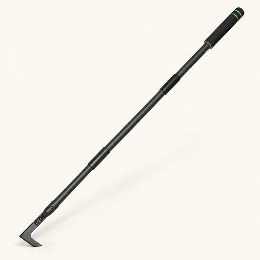 Black long crack weeder with green-ringed grip on an ivory background